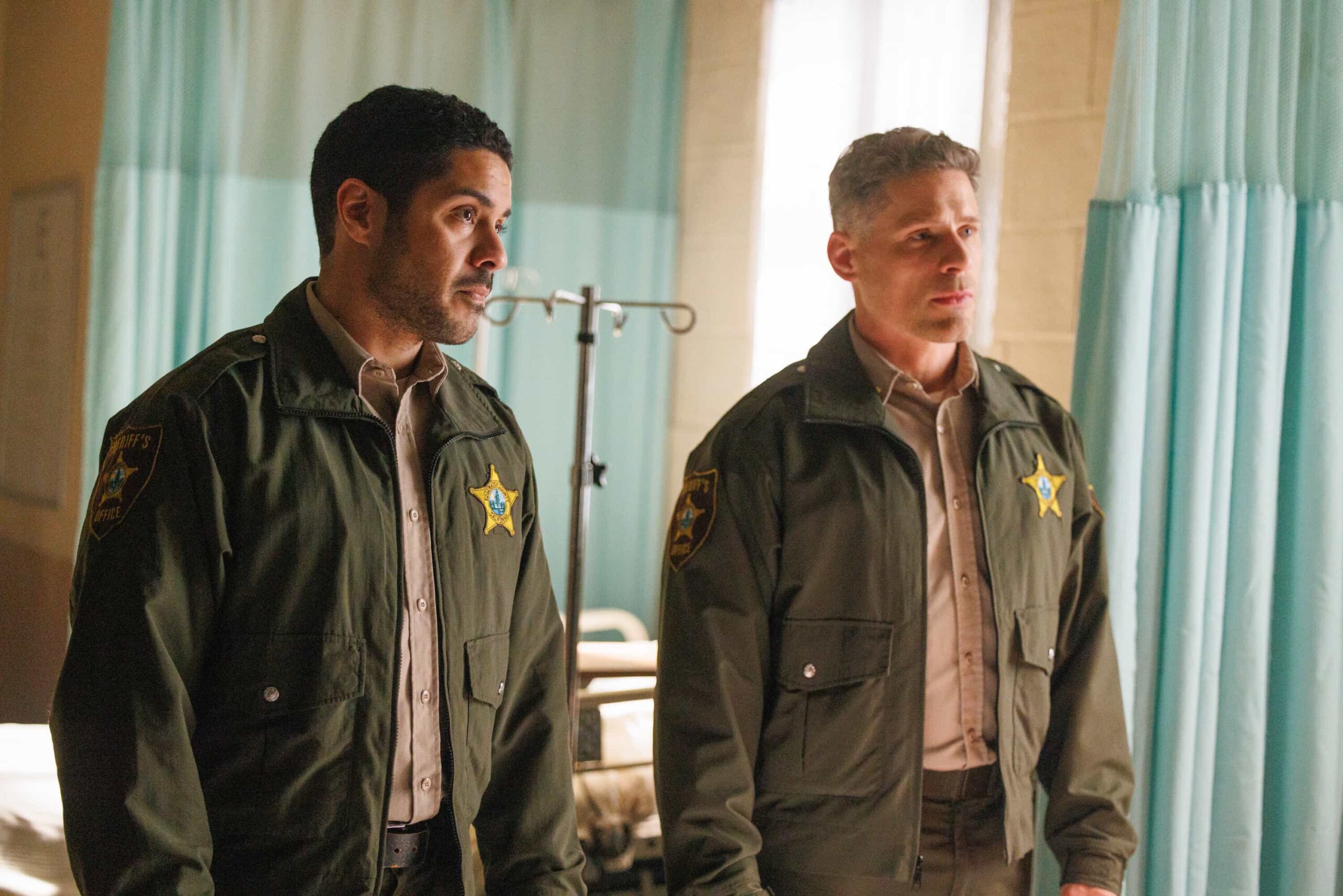 Sheriff Country Season 1 Episode 18  “The Gambler” – A dramatic federal crackdown rocks Edgewater and forces Sheriff Mickey Fox to confront a sprawling investigation that pits loyalty to her community against the reach of the DEA. The case pushes Mickey closer to home than ever before with consequences for the people she loves the most, on SHERIFF COUNTRY, Friday, May 8 (8:00-9:00 PM, ET/PT) on the CBS Television Network, and streaming on Paramount+ (live and on-demand for Paramount+ Pictured: Ian Quinlan as Hank and Matt Lauria as Boone. Photo: Darren Goldstein/CBS ©2026 CBS Broadcasting, Inc. All Rights Reserved.