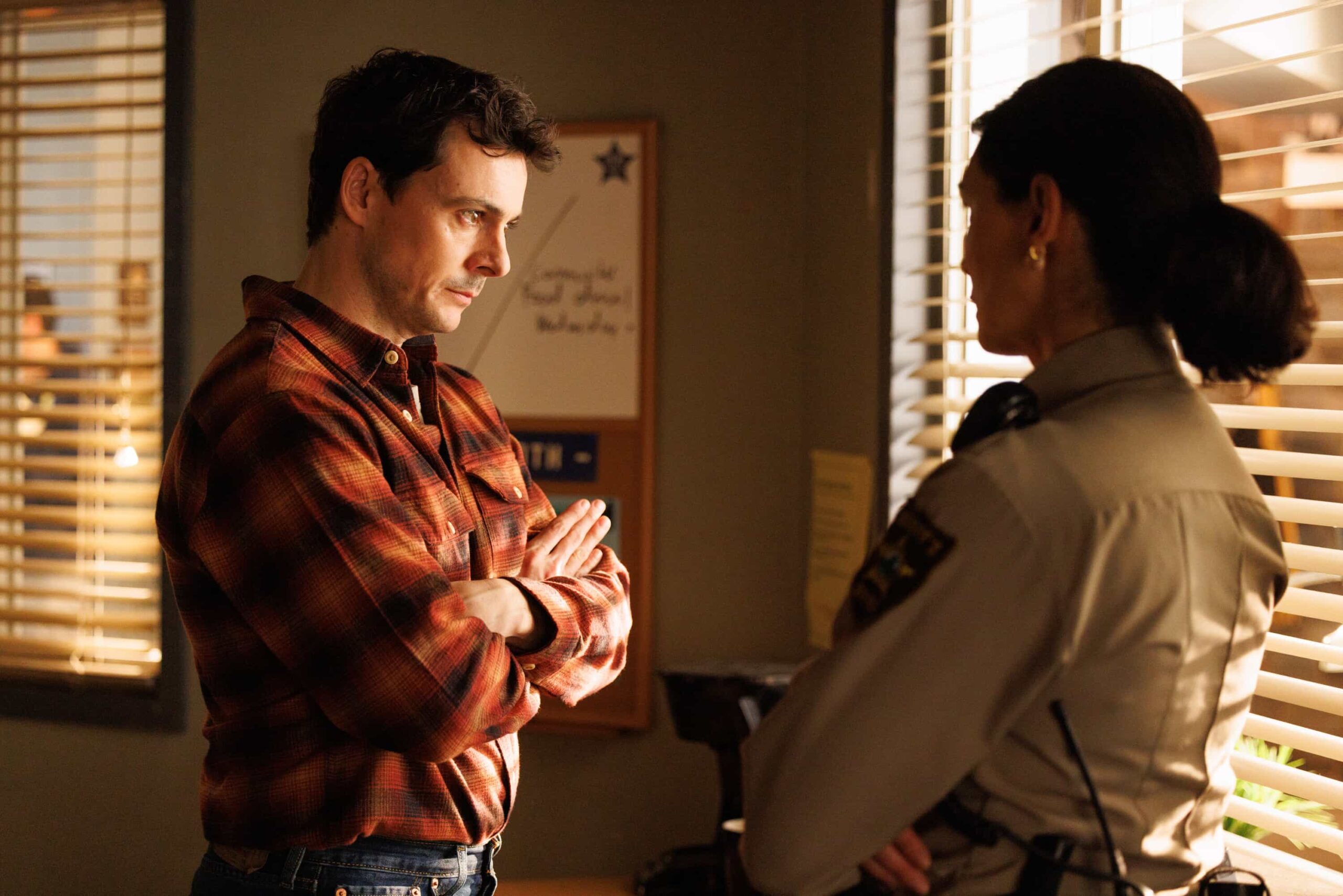 Sheriff Country Season 1 Episode 18  “The Gambler” – A dramatic federal crackdown rocks Edgewater and forces Sheriff Mickey Fox to confront a sprawling investigation that pits loyalty to her community against the reach of the DEA. The case pushes Mickey closer to home than ever before with consequences for the people she loves the most, on SHERIFF COUNTRY, Friday, May 8 (8:00-9:00 PM, ET/PT) on the CBS Television Network, and streaming on Paramount+ (live and on-demand for Paramount+ Pictured: Kelly Penner as Jay Miller. Photo: Darren Goldstein/CBS ©2026 CBS Broadcasting, Inc. All Rights Reserved.