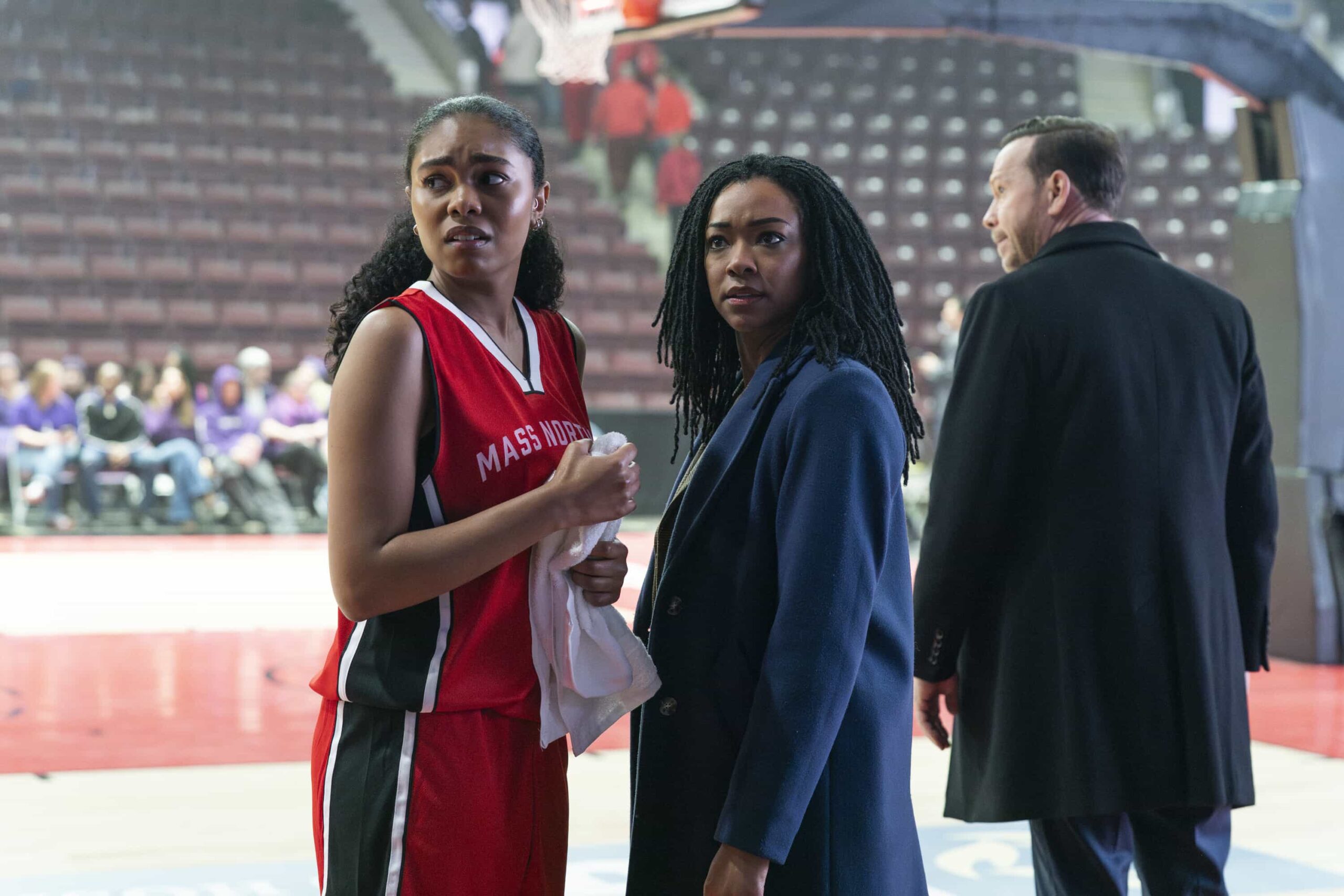 Boston Blue Season 1 Episode 18 "Personal Foul" -- Coverage of the CBS Original Series BOSTON BLUE, scheduled to air on the CBS Television Network. Pictured L to R: Arista Arhin as Soraya King, Sonequa Martin-Green as Lena Silver and Donnie Wahlberg as Danny Reagan. Photo: John Medland/CBS ©2026 CBS Broadcasting, Inc. All Rights Reserved.
