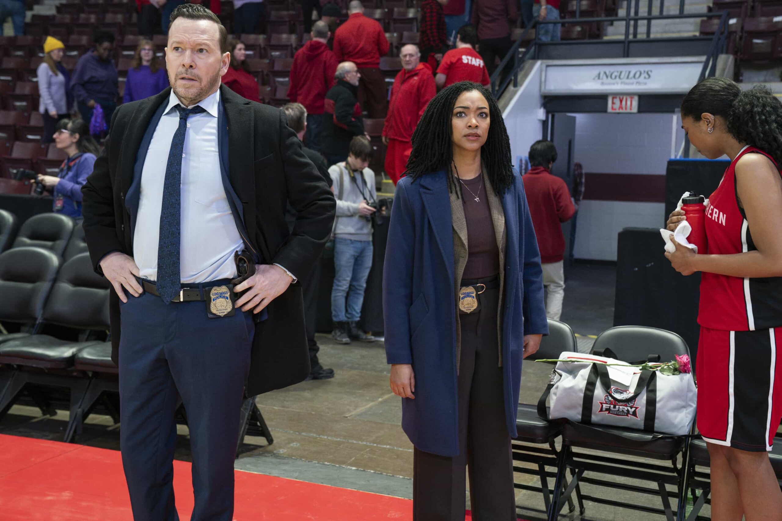 "Personal Foul" -- Coverage of the CBS Original Series BOSTON BLUE, scheduled to air on the CBS Television Network. Pictured L to R: Donnie Wahlberg as Danny Reagan and Sonequa Martin-Green as Lena Silver. Photo: John Medland/CBS ©2026 CBS Broadcasting, Inc. All Rights Reserved.