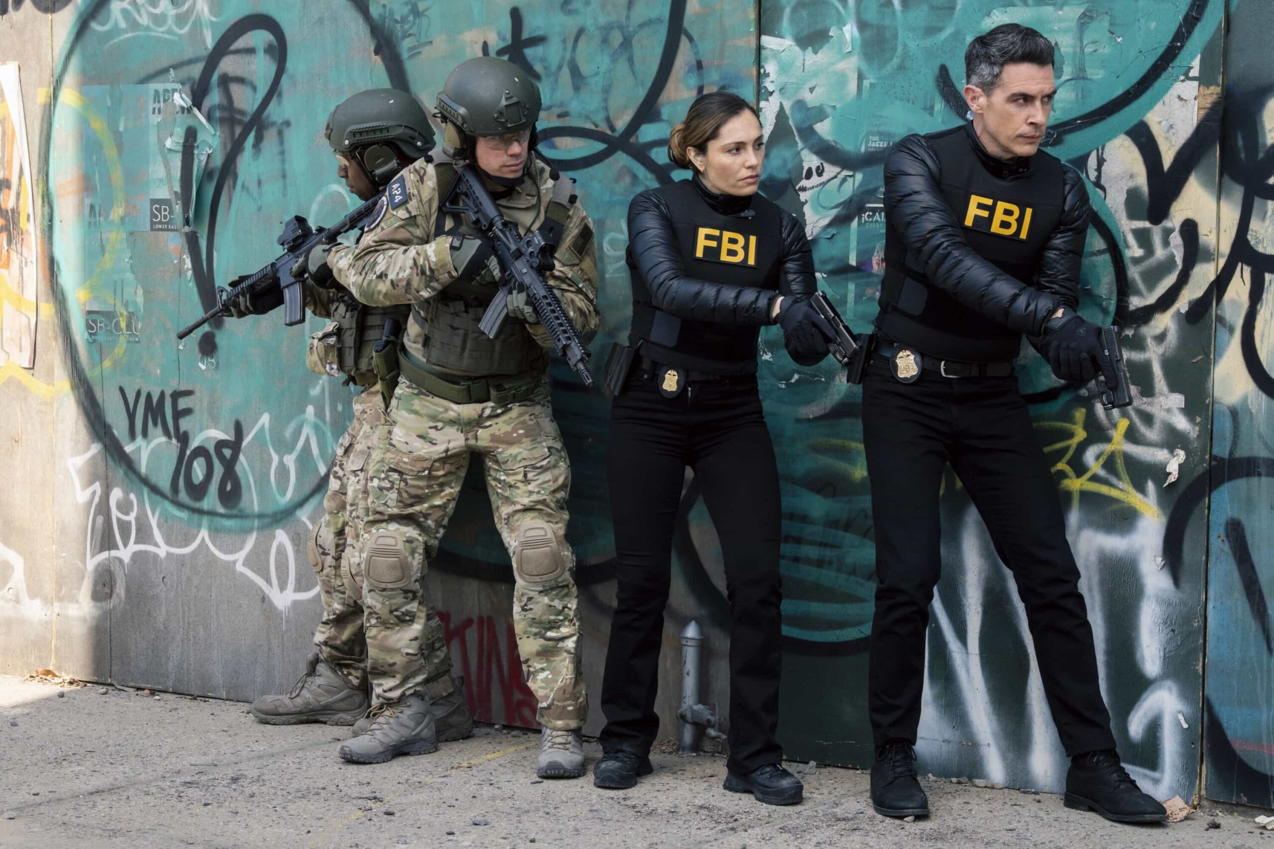 FBI Season 8 Episode 21 “Long Shot” — CBS Original Series FBI, scheduled to air on Monday, May 11 (9:00-10:00 PM, ET/PT).  Pictured (L-R): Juliana Aidén Martinez as Eva Ramos and John Boyd as Special Agent Stuart Scola. Photo: Bennett Raglin/CBS ©2026 CBS Broadcasting, Inc. All Rights Reserved.
