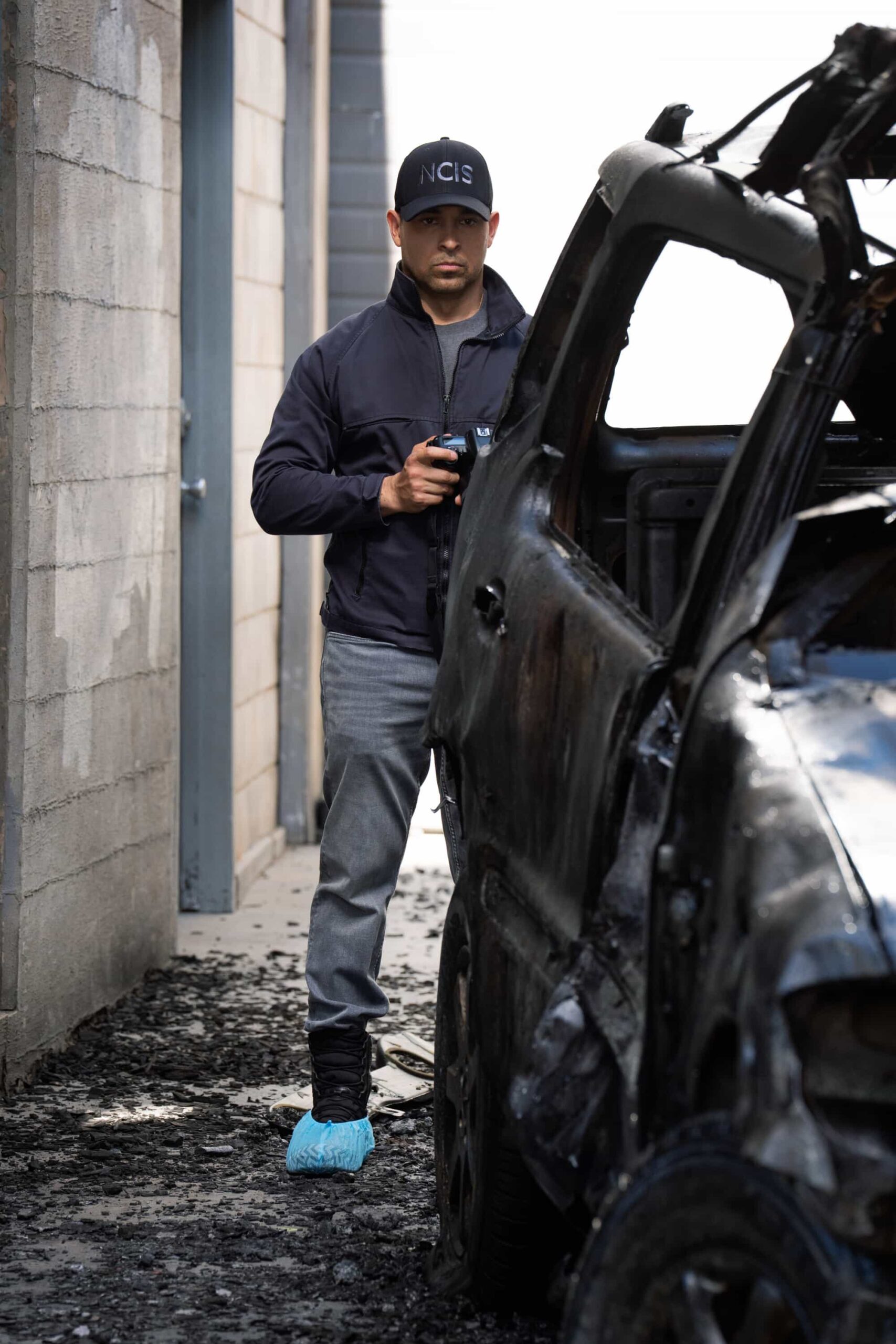 NCIS Season 23 Episode 20 Season Finale “SONS AND DAUGHTERS” - CBS Original Series NCIS, scheduled to air TUESDAY, MAY 12 (8:00 PM ET/PT)  Pictured (L-R): Wilmer Valderrama as Nick Torres,  Photo: Robert Voets/CBS  ©2026 CBS Broadcasting, Inc. All Rights Reserved.