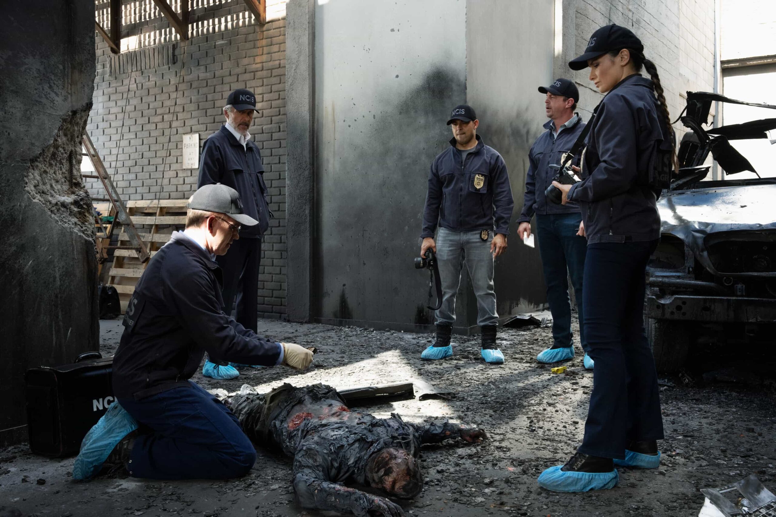 “SONS AND DAUGHTERS” - CBS Original Series NCIS, scheduled to air TUESDAY, MAY 12 (8:00 PM ET/PT)  Pictured (L-R): Sean Murray as Timothy McGee, Gary Cole as Alden Parker, Wilmer Valderrama as Nick Torres, Katrina Law as Jessica Knight, Brian Dietzen as Jimmy Palmer   Photo: Robert Voets/CBS  ©2026 CBS Broadcasting, Inc. All Rights Reserved.