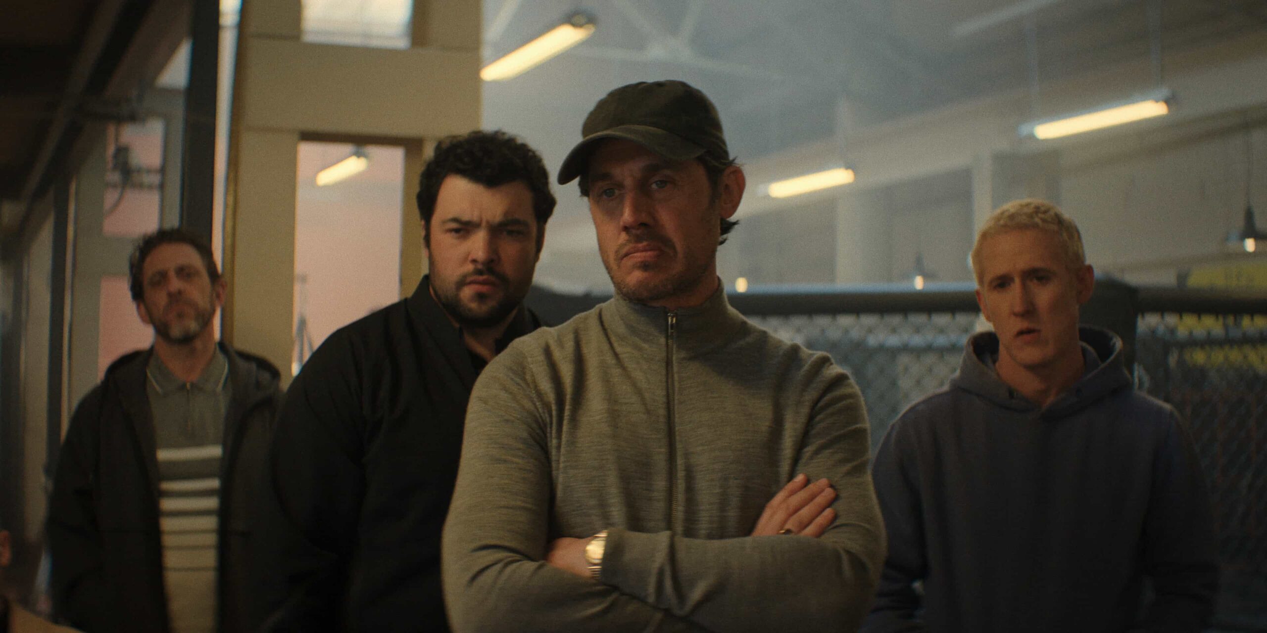 Paul Thornley, Dylan Corbett-Bader, Dustin Demri-Burns and Adam Gillen in "Criminal Record," now streaming on Apple TV.