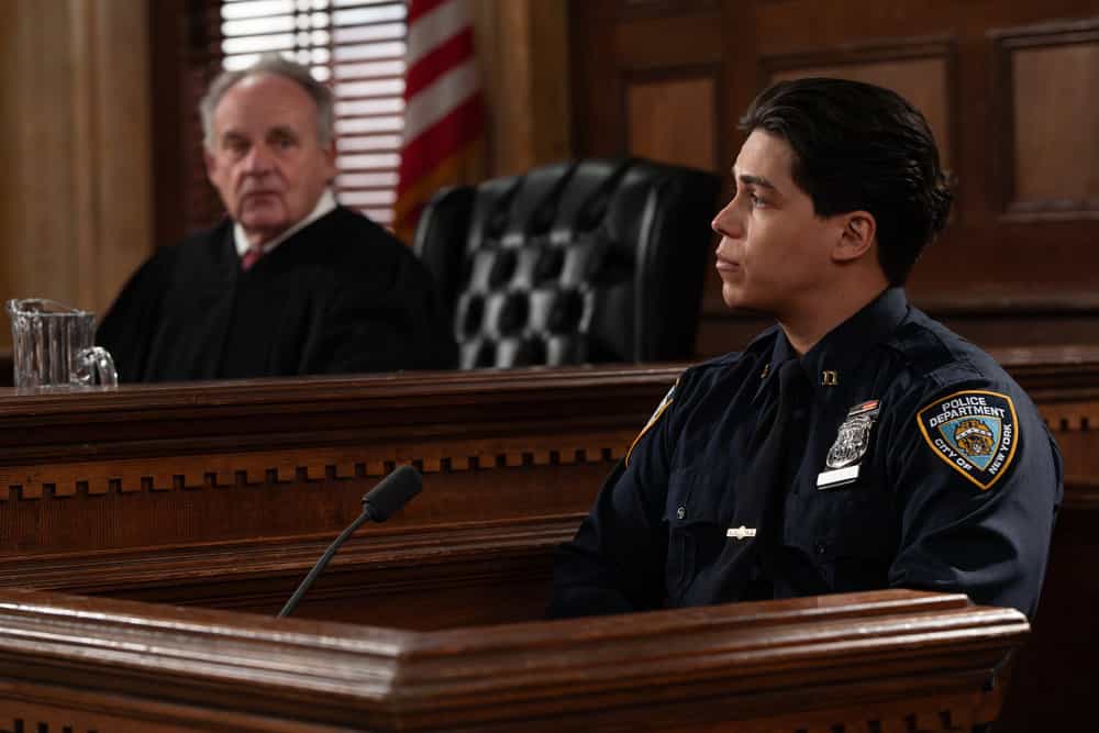 LAW & ORDER: SPECIAL VICTIMS UNIT -- "Monster" Episode 27021 -- Pictured: (l-r) Paul Guilfoyle as Judge Conover, Joseph Elliot Rodriguez as Officer Rodriguez -- (Photo by: Virginia Sherwood/NBC)