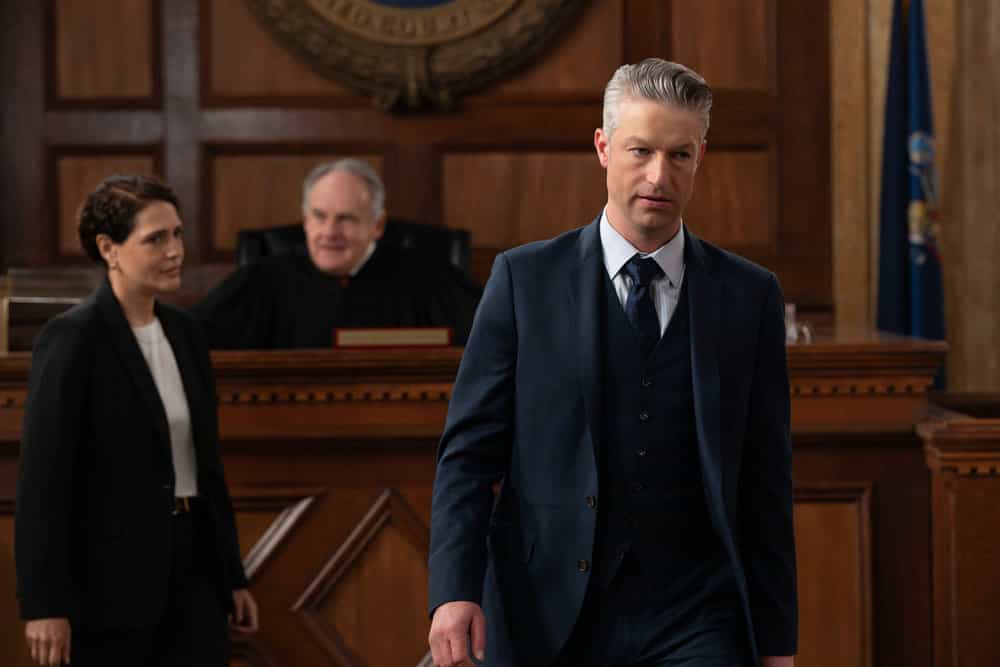 Law & Order SVU Season 27 Episode 21 Season Finale -- "Monster" Episode 27021 -- Pictured: (l-r) Monique Gabriela Curnen as Atty Fronczak, Paul Guilfoyle as Judge Conover, Peter Scanavino as A.D.A Dominick "Sonny" Carisi Jr. -- (Photo by: Virginia Sherwood/NBC)