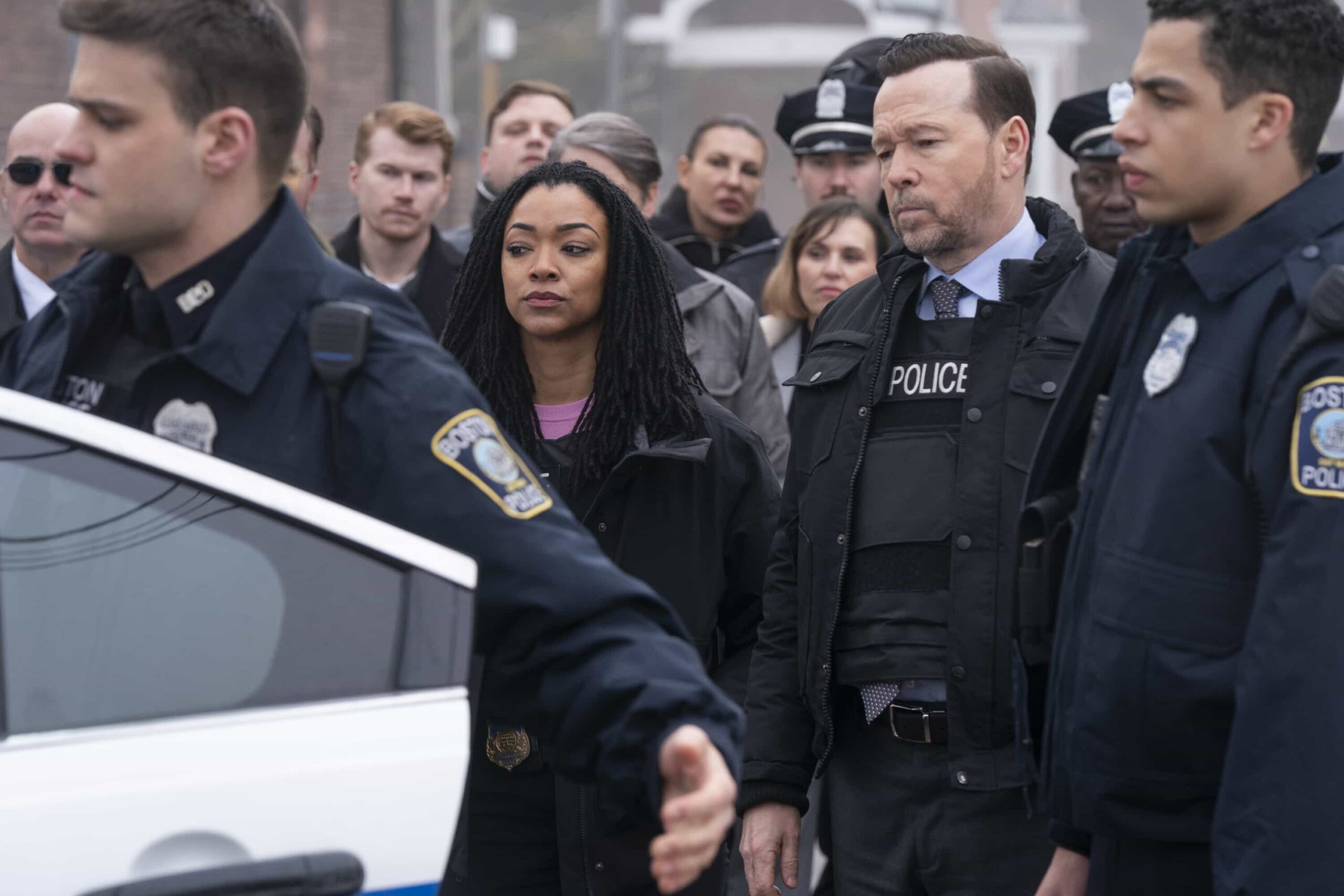"Chasing Monsters" -- Coverage of the CBS Original Series BOSTON BLUE, scheduled to air on the CBS Television Network. Pictured L to R: Mika Amonsen as Sean Reagan, Sonequa Martin-Green as Lena Silver, Donnie Wahlberg as Danny Reagan and Marcus Scribner as Jonah Silver. Photo: Ian Watson/CBS ©2026 CBS Broadcasting, Inc. All Rights Reserved.
