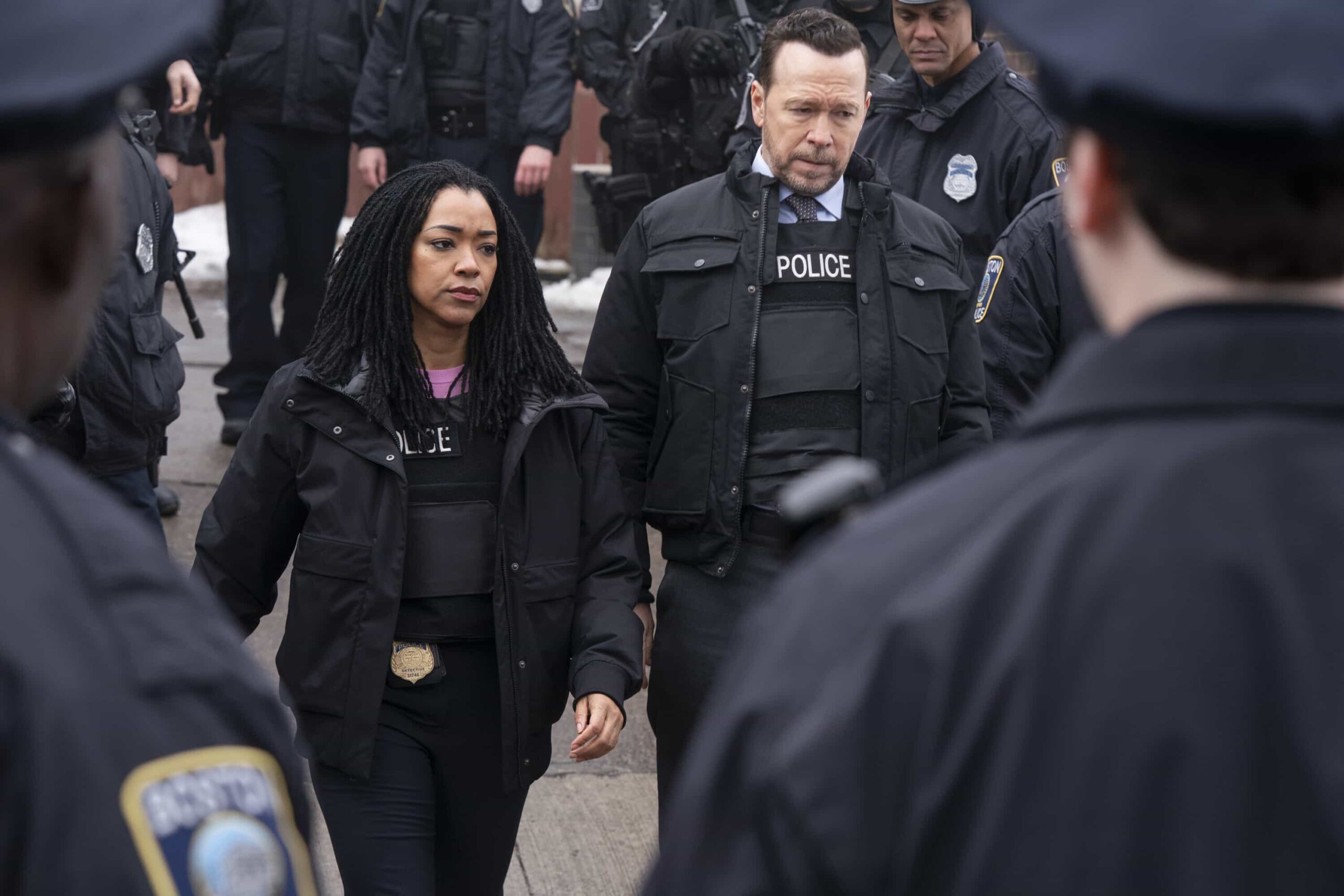 Boston Blue Season 1 Episode 19 "Chasing Monsters" -- Coverage of the CBS Original Series BOSTON BLUE, scheduled to air on the CBS Television Network. Pictured L to R: Sonequa Martin-Green as Lena Silver and Donnie Wahlberg as Danny Reagan. Photo: Ian Watson/CBS ©2026 CBS Broadcasting, Inc. All Rights Reserved.