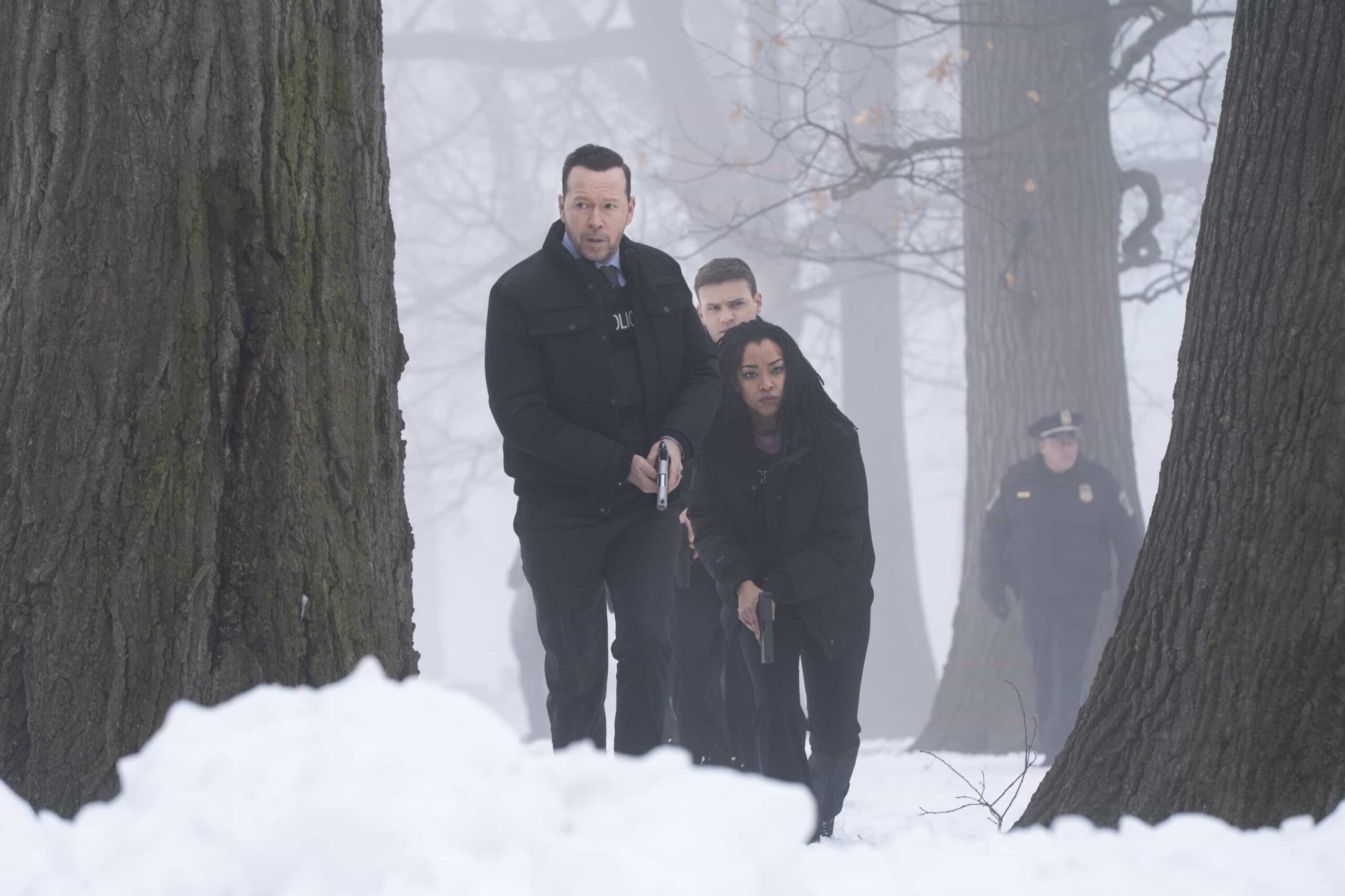 Boston Blue Season 1 Episode 19 "Chasing Monsters" -- Coverage of the CBS Original Series BOSTON BLUE, scheduled to air on the CBS Television Network. Pictured L to R: Donnie Wahlberg as Danny Reagan, Mika Amonsen as Sean Reagan and Sonequa Martin-Green as Lena Silver. Photo: Ian Watson/CBS ©2026 CBS Broadcasting, Inc. All Rights Reserved.