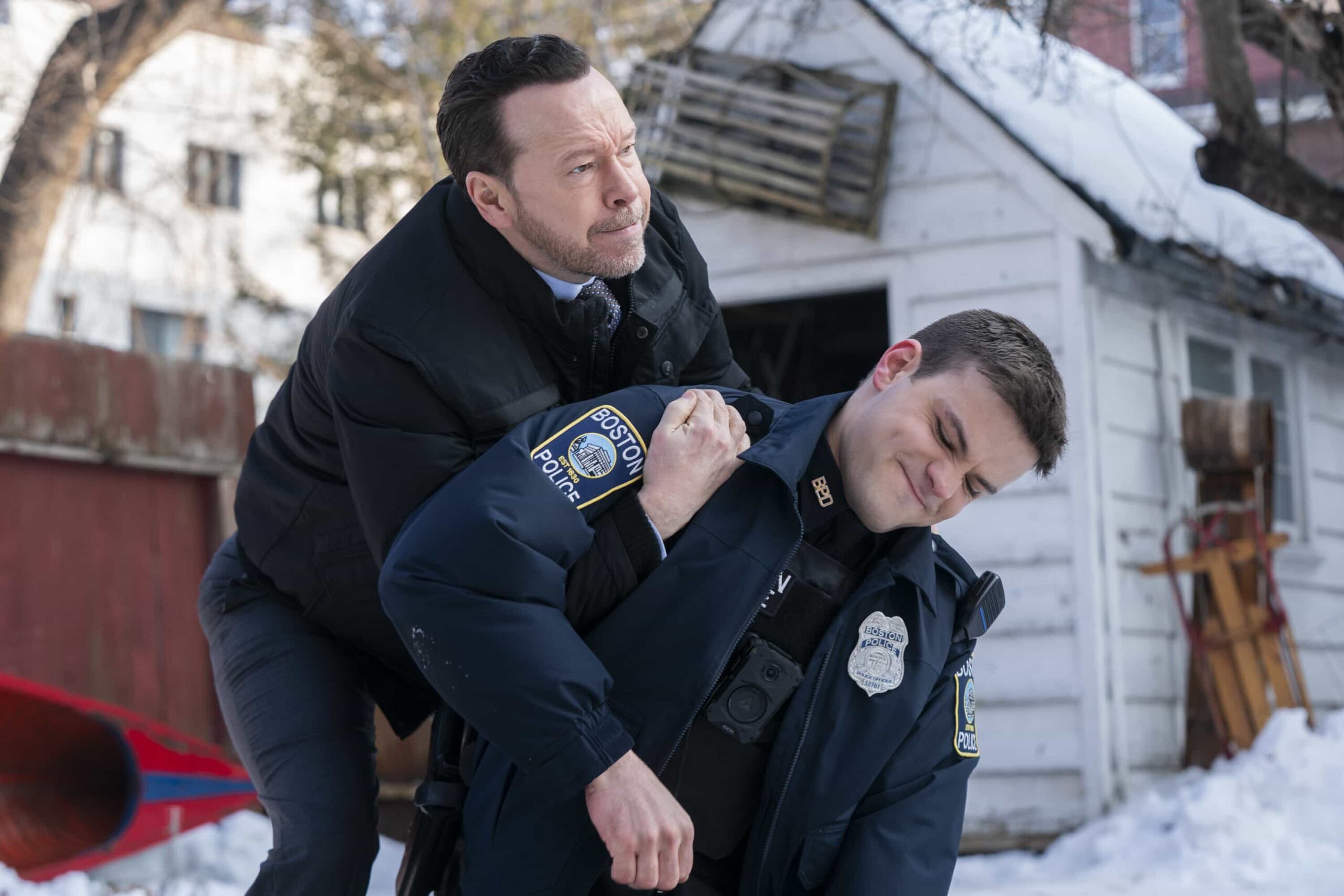 "Chasing Monsters" -- Coverage of the CBS Original Series BOSTON BLUE, scheduled to air on the CBS Television Network. Pictured L to R: Donnie Wahlberg as Danny Reagan and Mika Amonsen as Sean Reagan. Photo: Ian Watson/CBS ©2026 CBS Broadcasting, Inc. All Rights Reserved.