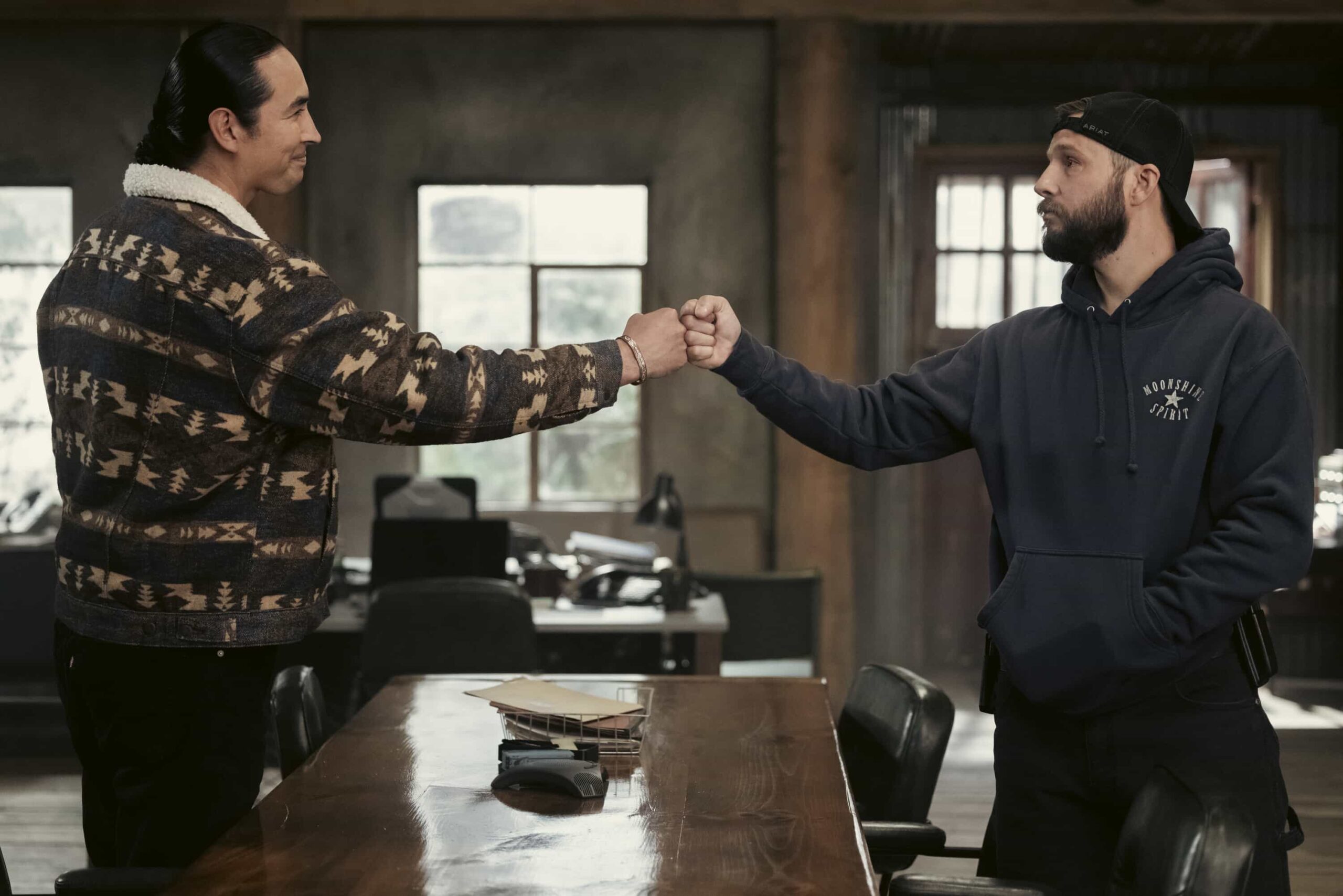 "Wolves at the Door" -- CBS Original Series MARSHALS, scheduled to air on Sunday, May 24 (8:00-9:00 PM, ET/PT).  Pictured (L-R): Tatanka Means as Miles and Logan Marshall-Green as Pete Calvin. Photo: Fred Hayes/CBS ©2025 CBS Broadcasting, Inc. All Rights Reserved.