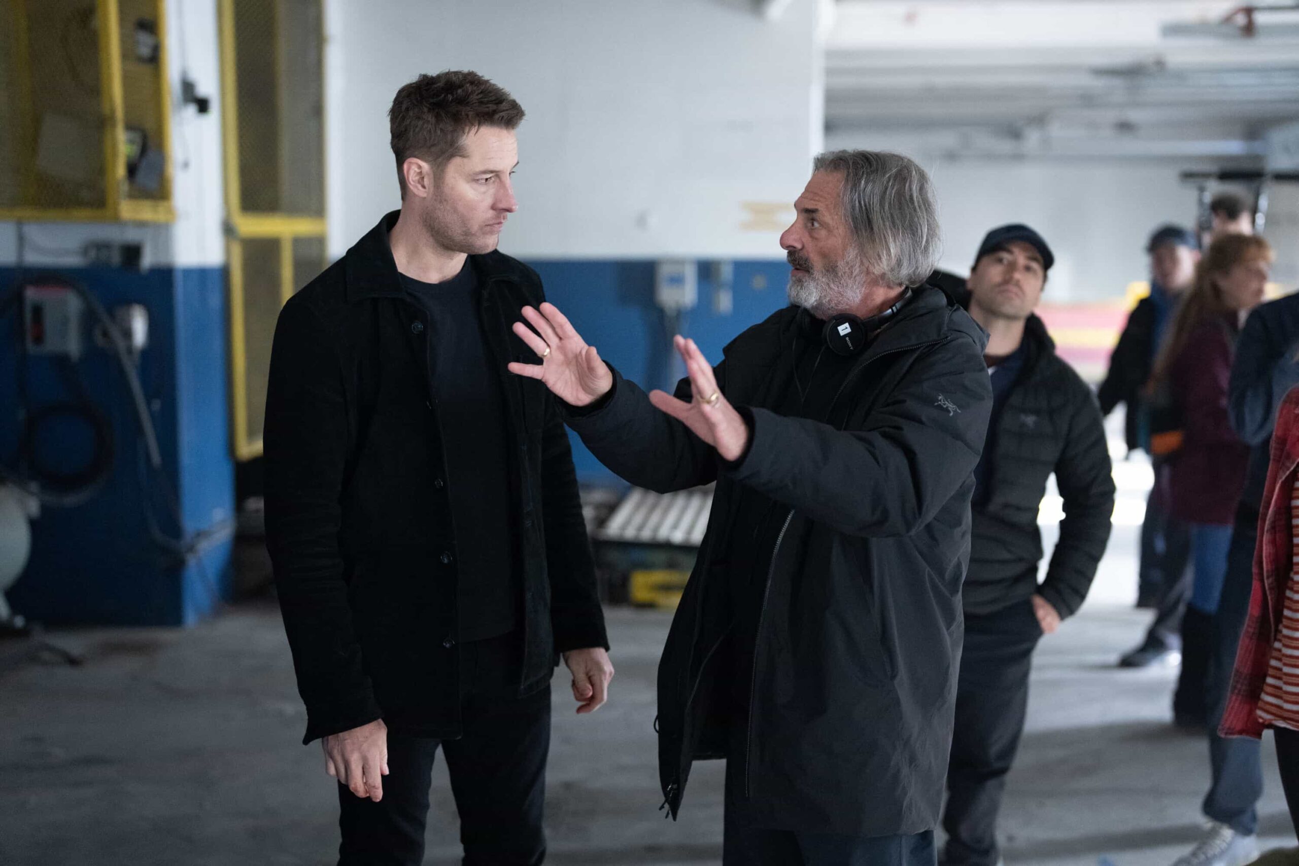 Behind The Scenes “The Best Ones” – Colter and Russell search for a victim of a nefarious research project, on the third season finale of the CBS Original series TRACKER, Sunday, May 24 (9:00-10:00 PM, ET/PT) on the CBS Television Network, and streaming on Paramount+ (live and on-demand for Paramount+ Premium plan subscribers, or on-demand for Paramount+.  Pictured: Justin Hartley and Director Ken Olin.  Photo: Darko Sikman/CBS ©2026 CBS Broadcasting, Inc. All Rights Reserved.