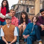 A Good Girl's Guide to Murder: Season 2. (L-R) Yali Topol Margalith as Lauren Gibson, Jude Morgan-Collie as Connor Reynolds, Freddie England as Robin Hastings, Asha Banks as Cara Ward, Emma Myers as Pip Fitz-Amobi, and Zain Iqbal as Ravi Singh in A Good Girl's Guide to Murder: Season 2. Cr. NETFLIX © 2026