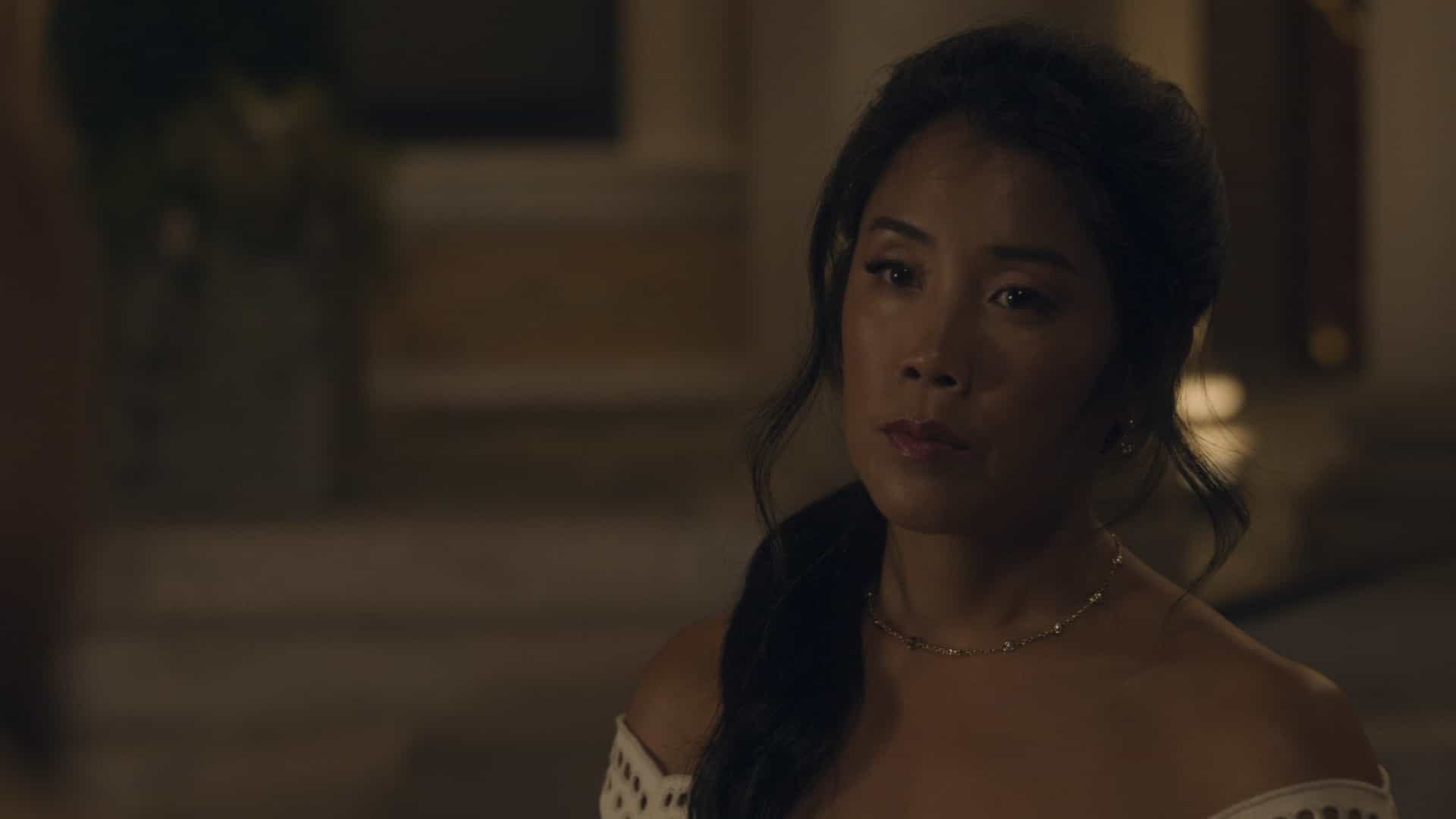 YOUR FRIENDS & NEIGHBORS Season 2 Episode 10 Finale Photos “The Night of the Hunter” 4 Eunice Bae in "Your Friends & Neighbors," now streaming on Apple TV.