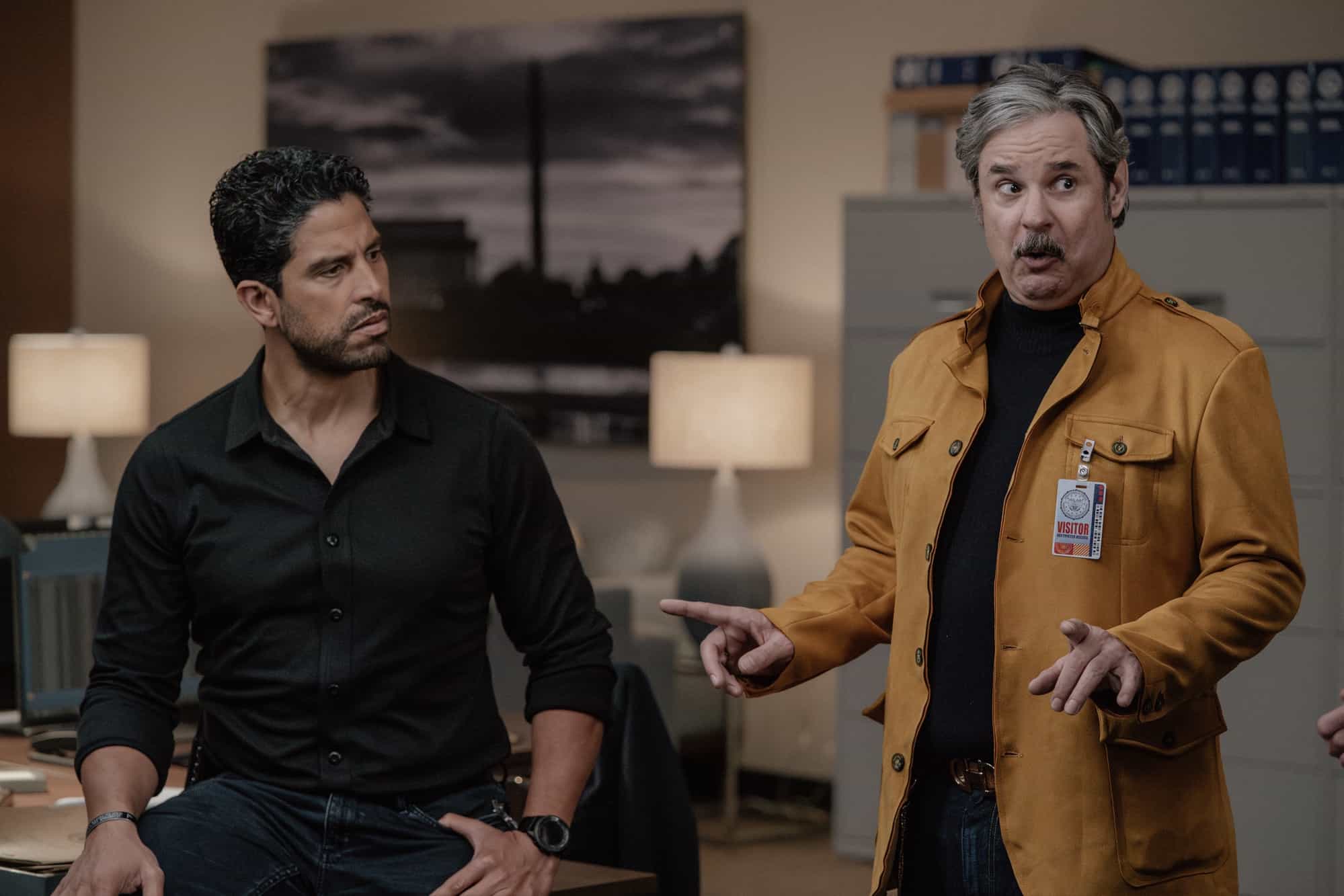 Adam Rodriguez as Luke Alvez and Paul F. Tompkins as Brian Garrity in Criminal Minds: Evolution, episode 6, season 19  streaming on Paramount+, 2026.  CREDIT:  Michael Yarish/Paramount+ © 2026 ABC Studios Inc. and CBS Studios Inc. All Rights Reserved.