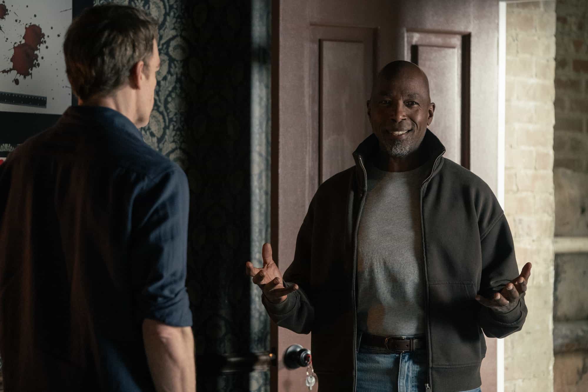 L-R: Michael C. Hall as Dexter Morgan and Ntare Guma Mbaho Mwine as Blessing Kamara in Dexter: Resurrection, episode 1, season 2, streaming on Paramount+, 2026. Photo Credit: Matt Infante/Paramount+.