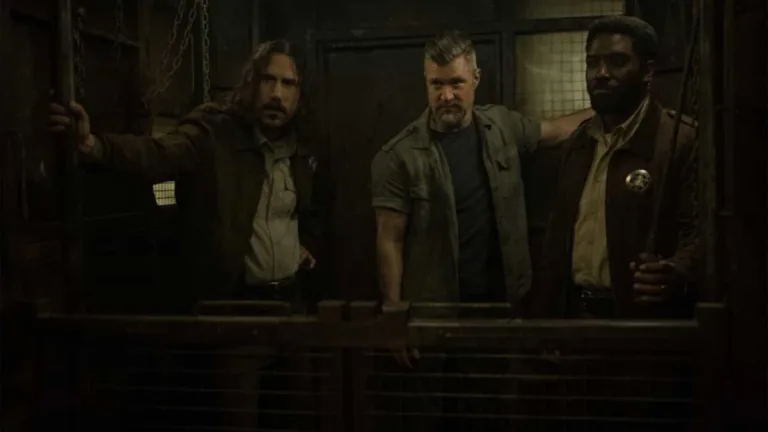 Billy Postlethwaite, Shane McRae and Chinaza Uche in "Silo," now streaming on Apple TV.