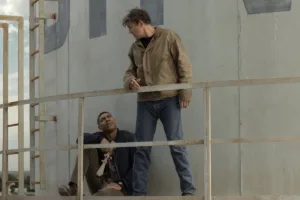 Aaron Pierre as John Stewart and Kyle Chandler as Hal Jordan in Lanterns Season 1 Episode 4 The Weenie