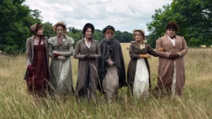 Pride and Prejudice Netflix Series (L-R) Emma Corrin, Freya Mavor, Olivia Colman, Hopey Parish, Hollie Avery