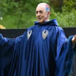 Alan Cumming as host of The Traitors.