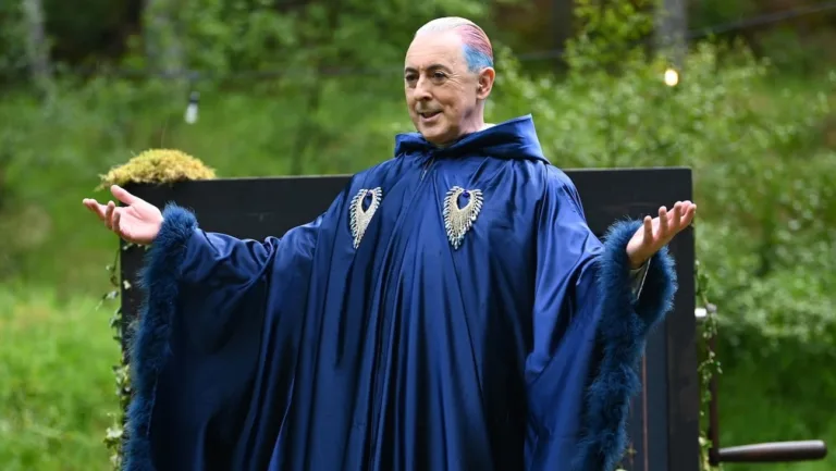 Alan Cumming as host of The Traitors.