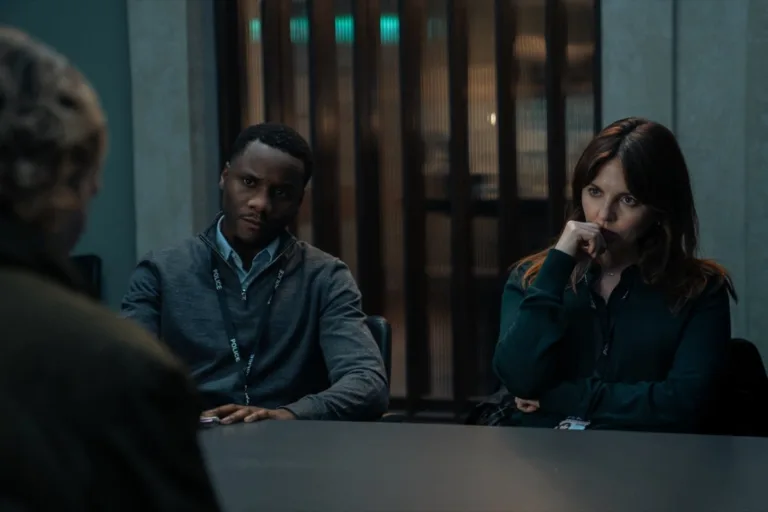 L-R Tobi Bakare as Mike Atkins and Ophelia Lovibond as Kavanagh In MobLand, episode 1, season 2, streaming on Paramount+, 2026. Photo Credit: Sophie Mutevelian/Paramount+