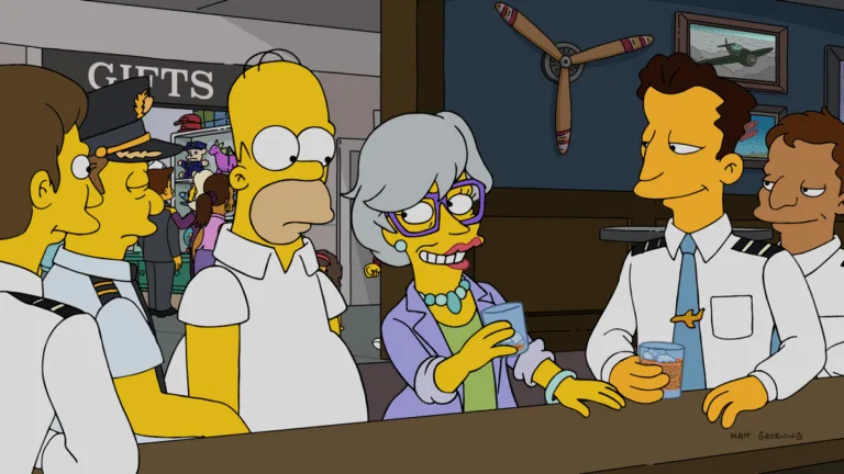 The Simpsons Season 38 Episode 1 "The Children's Book Job" - Marge hopes to save Springfield Elementary by inviting a reclusive British children’s author (guest star Emma Thompson) to appear at the school’s book fair. But Homer botches his assignment of picking the author up at the airport, and the drunken pepper pot leads him on a desperate wild chase to get her to the school on time in the all-new "The Children's Book Job" episode of THE SIMPSONS airing Sunday, Sep 27 8:00-8:30 PM ET/PT on FOX. (SI-3710)