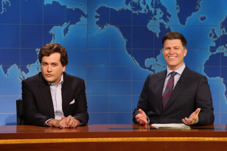 SATURDAY NIGHT LIVE -- Episode 1905 -- Pictured: (l-r) Jeremy Culhane as Tucker Carlson and anchor Colin Jost during Weekend Update on Saturday, September 26, 2026 -- (Photo by: Will Heath/NBC)