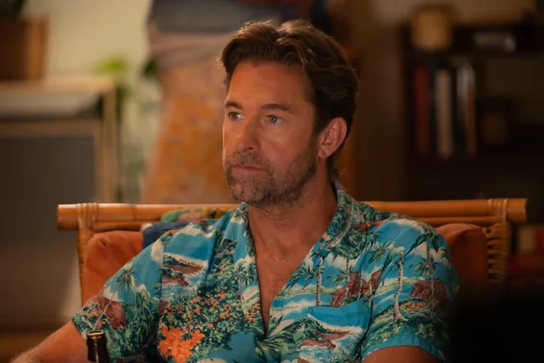 Scott Speedman as R.J. Decker sits indoors wearing a blue tropical-print shirt in “The Angler.”