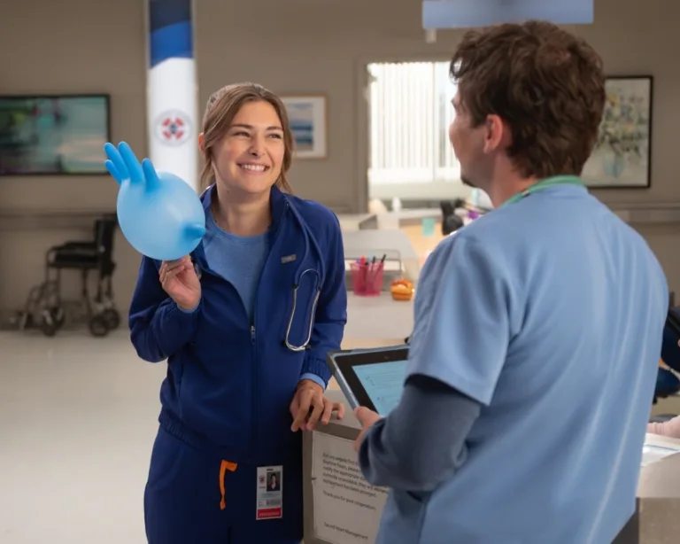 SCRUBS - “My Mentee” - J.D. attempts an insurance workaround, creating tension with his new mentee. Meanwhile, Elliot tries to guide Tosh’s specialty choices, and Turk flexes his own skills as a mentor. WEDNESDAY, SEPT. 30 (8:31-9:02 p.m. EDT) on ABC. (Disney/Sergei Bachlakov) 
AVA BUNN with blue balloon glove.