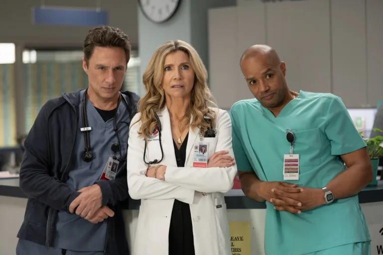 J.D. (Zach Braff), Elliot (Sarah Chalke) and Turk (Donald Faison) stand together at Sacred Heart in Scrubs Season 11 Episode 2, “My Mentee.”