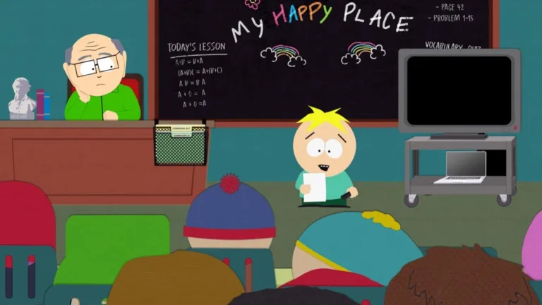 Butters holds a sheet of paper in front of his classmates while Mr. Garrison watches in South Park Season 29 Episode 2, “Billionaire Weenietown.”