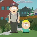Butters holds a sheet of paper in front of his classmates while Mr. Garrison watches in South Park Season 29 Episode 2, “Billionaire Weenietown.”