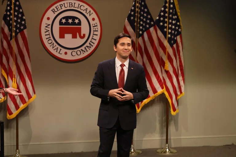 SATURDAY NIGHT LIVE -- Episode 1906 -- Pictured: Marcello Hernández as Marco Rubio during the "Midterm Ads Cold Open" on Saturday, October 3, 2026 -- (Photo by: Will Heath/NBC)