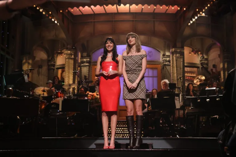 SATURDAY NIGHT LIVE -- Episode 1906 -- Pictured: (l-r) Host Dakota Johnson and special guest Taylor Swift during the monologue on Saturday, October 3, 2026 -- (Photo by: Will Heath/NBC)
