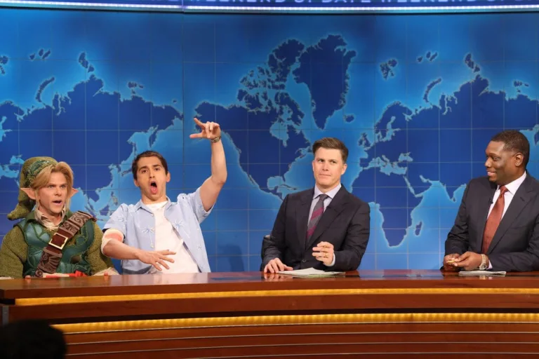 SATURDAY NIGHT LIVE -- Episode 1906 -- Pictured: (l-r) Mikey Day as Link, Marcello Hernández as Jason from GTA VI, and anchors Colin Jost and Michael Che during Weekend Update on Saturday, October 3, 2026 -- (Photo by: Will Heath/NBC)