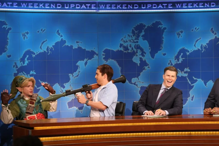 SATURDAY NIGHT LIVE -- Episode 1906 -- Pictured: (l-r) Mikey Day as Link, Marcello Hernández as Jason from GTA VI, and anchor Colin Jost during Weekend Update on Saturday, October 3, 2026 -- (Photo by: Will Heath/NBC)