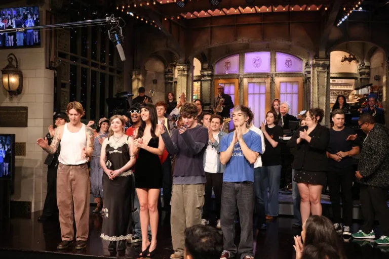 SATURDAY NIGHT LIVE -- Episode 1906 -- Pictured: (l-r) Musical guest Turnstile and host Dakota Johnson during Goodnights & Credits on Saturday, October 3, 2026 -- (Photo by: Will Heath/NBC)