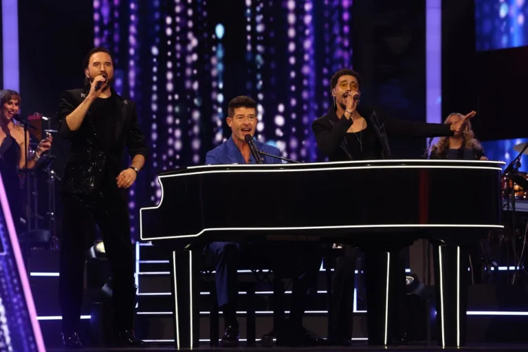 New bandleader Robin Thicke at the piano on the set of Name That Tune on FOX.