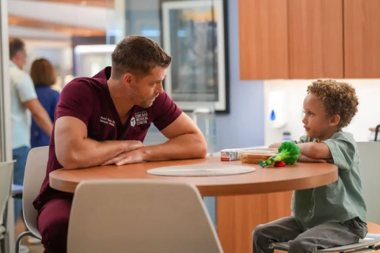 CHICAGO MED Season 12 Episode 2 -- "Third Rails" Episode 1202 -- Pictured: (l-r) Luke Mitchell as Dr. Mitch Ripley, Jaxson Sumler as Jaxson -- (Photo by: James Washington/NBC)