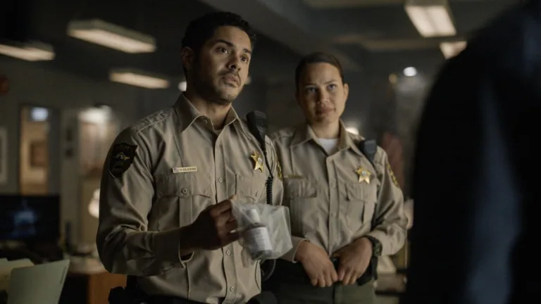 Sheriff Country Season 2 Episode 2 - “Family Trust” -- CBS Original Series Sheriff Country, scheduled to air on Friday, Oct. 16 (8:00-9:00 PM, ET/PT), on the CBS Television Network. Pictured (L-R): Ian Quinlan as Hank Iglesias and Michele Weaver as Cassidy. Photo: CBS ©2026 CBS Broadcasting, Inc. All Rights Reserved. Highest quality screengrab available.