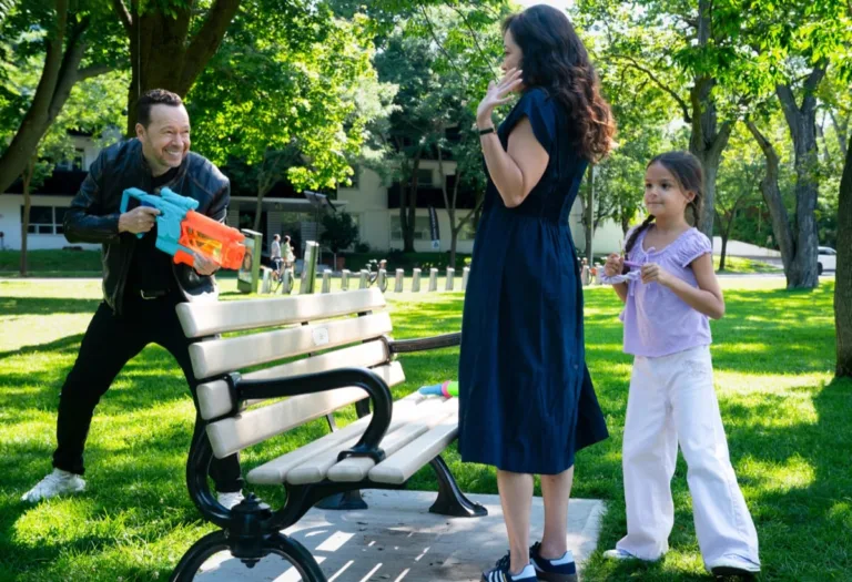 "Ripple Effect " -- Coverage of the CBS Original Series Boston Blue, scheduled to air on the CBS Television Network. Pictured (L-R): Donnie Wahlberg as Danny Reagan, Marisa Ramirez as Maria Baez, and Eleanor & Penelope Yataco as Elena Baez Photo: Ian Watson/CBS ©2026 CBS Broadcasting, Inc. All Rights Reserved.