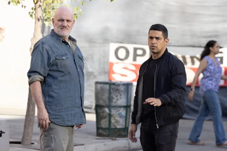 NCIS Season 24 Episode 3 "Sleeping Dogs" -- Coverage of the CBS Original Series NCIS, scheduled to air on the CBS Television Network. Pictured (L to R): Wilmer Valderrama as Nicholas “Nick” Torres, Mike O’Malley as Walt Keller Photo: Sonja Flemming/CBS ©2026 CBS Broadcasting, Inc. All Rights Reserved.