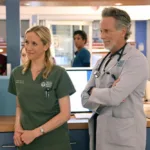 Chicago Med Season 12 Episode 3 -- "They Call Me Ms. Goodwin" Episode 1203 -- Pictured: (l-r) Jessy Schram as Dr. Hannah Asher, Steven Weber as Dr. Dean Archer -- (Photo by: George Burns Jr/NBC)