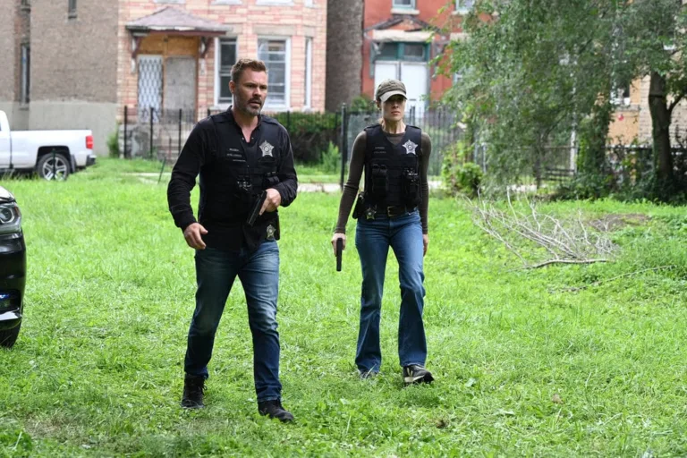 CHICAGO P.D. Season 14 Episode 3 -- "Under the Surface " Episode 1403 -- Pictured: (l-r) Patrick John Flueger as Officer Adam Ruzek, Marina Squerciati as Officer Kim Burgess -- (Photo by: Lori Allen/NBC)