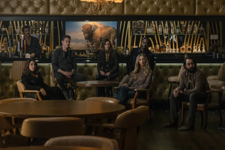 Tulsa King Season 4 Episode 2 Blind Rooster (L-R): Garrett Hedlund as Mitch, Annabella Sciorra as Joanne, Chris Caldovino as Goodie, McKenna Quigley Harrington as Grace, Jay Will as Tyson, Scarlet Stallone as Spencer, and Martin Starr as Bodhi in Tulsa King, episode 2, season 4, streaming on Paramount+, 2026. Photo Credit: Steve Swisher/Paramount+
