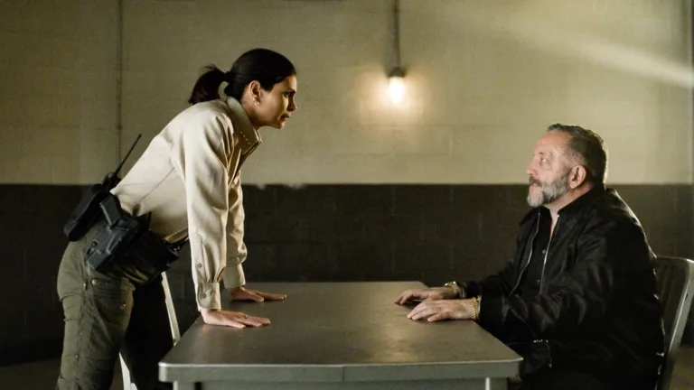 Sheriff Country Season 2 Episode 3- “Ulysses” -- CBS Original Series Sheriff Country, scheduled to air on Friday, Oct. 23 (8:00-9:00 PM, ET/PT), on the CBS Television Network. Pictured (L-R): Morena Baccarin as Sheriff Mickey Fox and Ron Kennell as Petar. Photo: CBS ©2026 CBS Broadcasting, Inc. All Rights Reserved. Highest quality screengrab available.