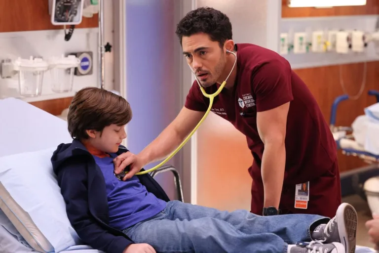 CHICAGO MED Season 12 Episode 4 -- "Tomorrow, and Tomorrow, and Tomorrow" Episode 1204 -- Pictured: (l-r) Angus Caldwell as Caleb, Darren Barnett as Dr. John Frost -- (Photo by: George Burns Jr/NBC)