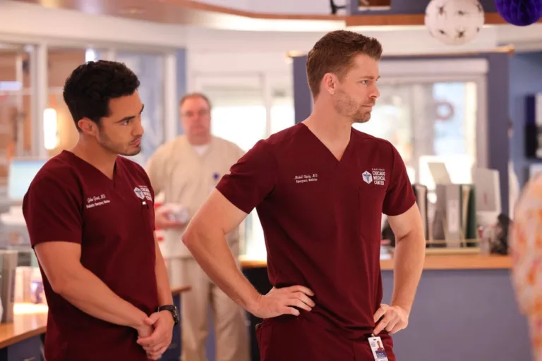 CHICAGO MED Season 12 Episode 4 -- "Tomorrow, and Tomorrow, and Tomorrow" Episode 1204 -- Pictured: (l-r) Darren Barnett as Dr. John Frost, Luke Mitchell as Dr. Mitch Ripley -- (Photo by: George Burns Jr/NBC)