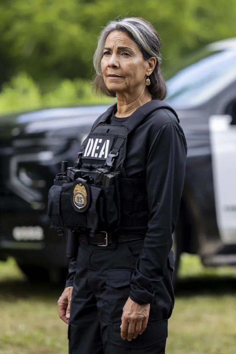 "Maria" -- CBS Original Series Sheriff Country, scheduled to air on Friday, Oct. 30 (8:00-9:00 PM, ET/PT), on the CBS Television Network. Pictured: Rachel Ticotin as Eva Santos. Photo: Darren Goldstein/CBS ©2026 CBS Broadcasting, Inc. All Rights Reserved.
